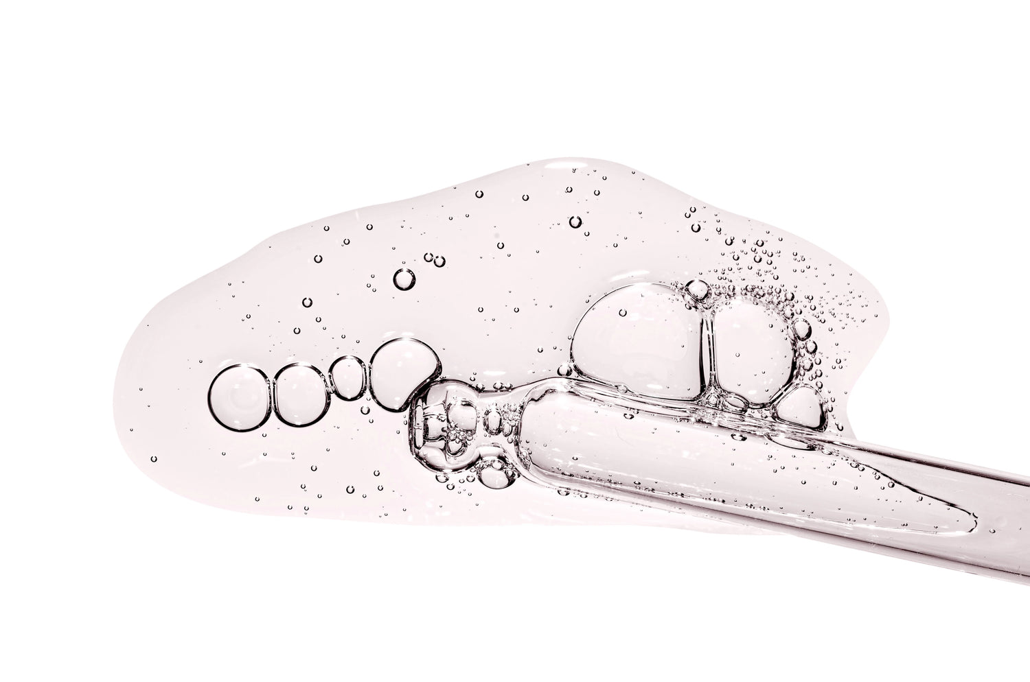 Texture de gel transparent avec bulles et pipette, illustration d’un exfoliant AHA / peeling visage.