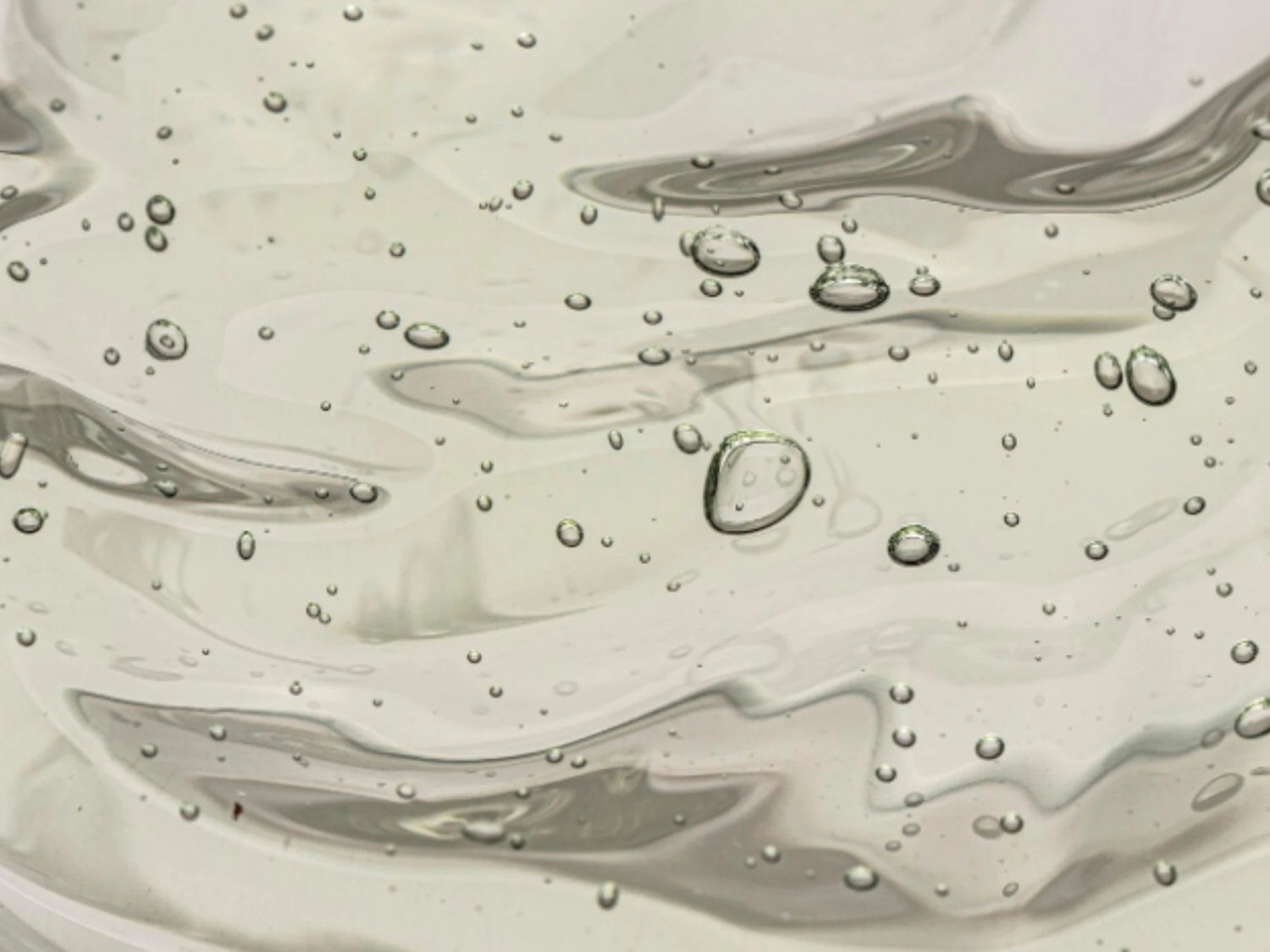 Gouttes de texture du gel hydratant visage – gel double hydratation à l’acide hyaluronique