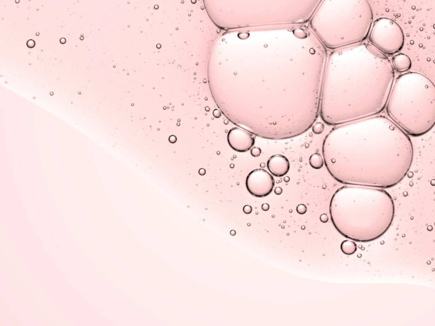 Illustration abstraite de bulles rosées en macro, associée au Hexapeptide-11, un peptide utilisé en cosmétique pour soutenir l’aspect lisse et tonique de la peau.