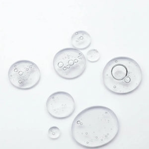 Illustration texture sérum translucide pour représenter un lysat fermenté (postbiotique) du sérum gelée aux prébiotiques bioactifs.